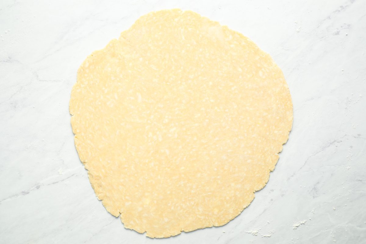 homemade pie crust rolled into a 12 to 13-inch circle on a lightly floured surface