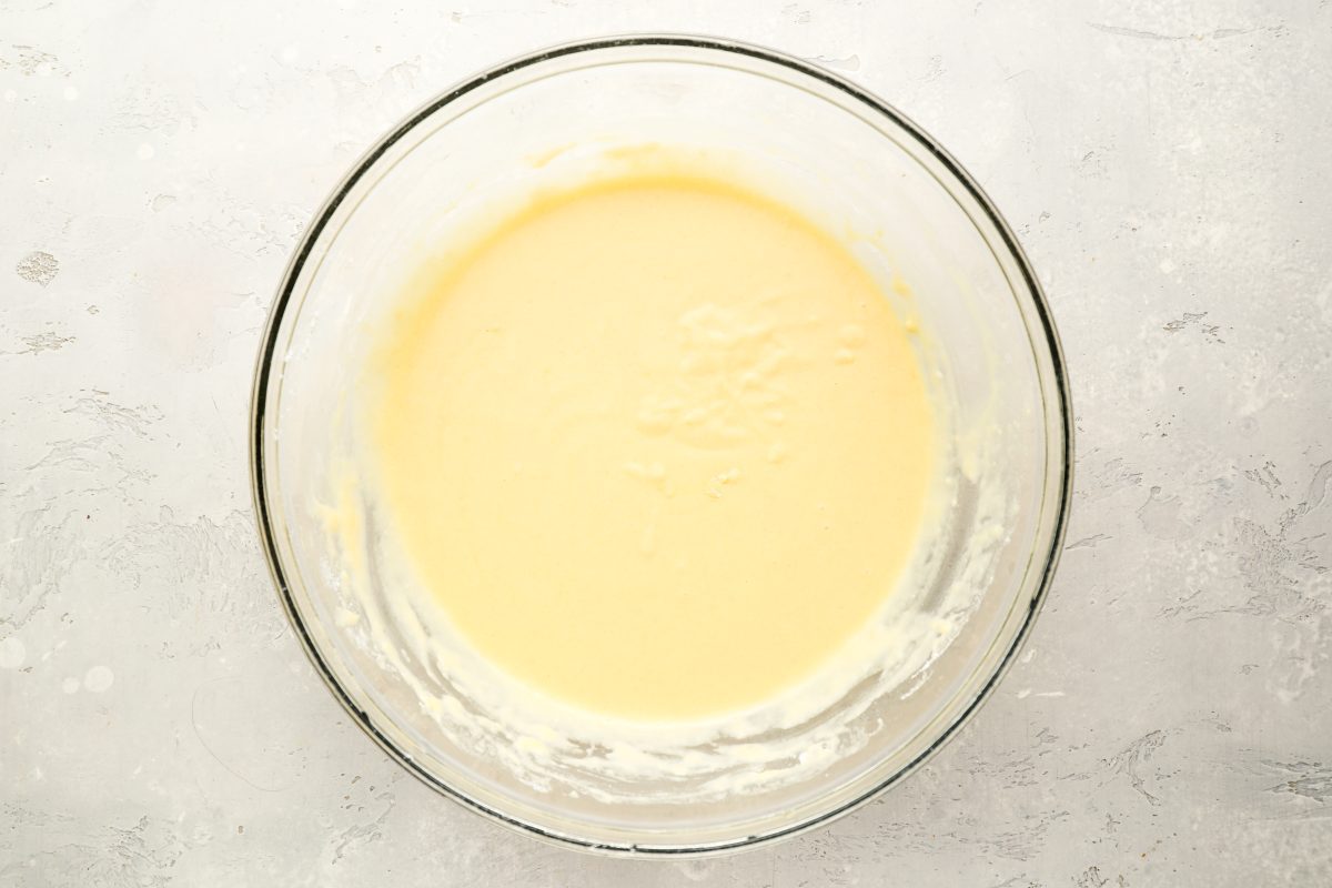 flour and milk fully combined with egg/butter mixture in large mixing bowl 