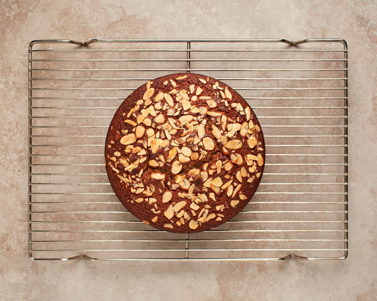 baked honey cake cooling on rack