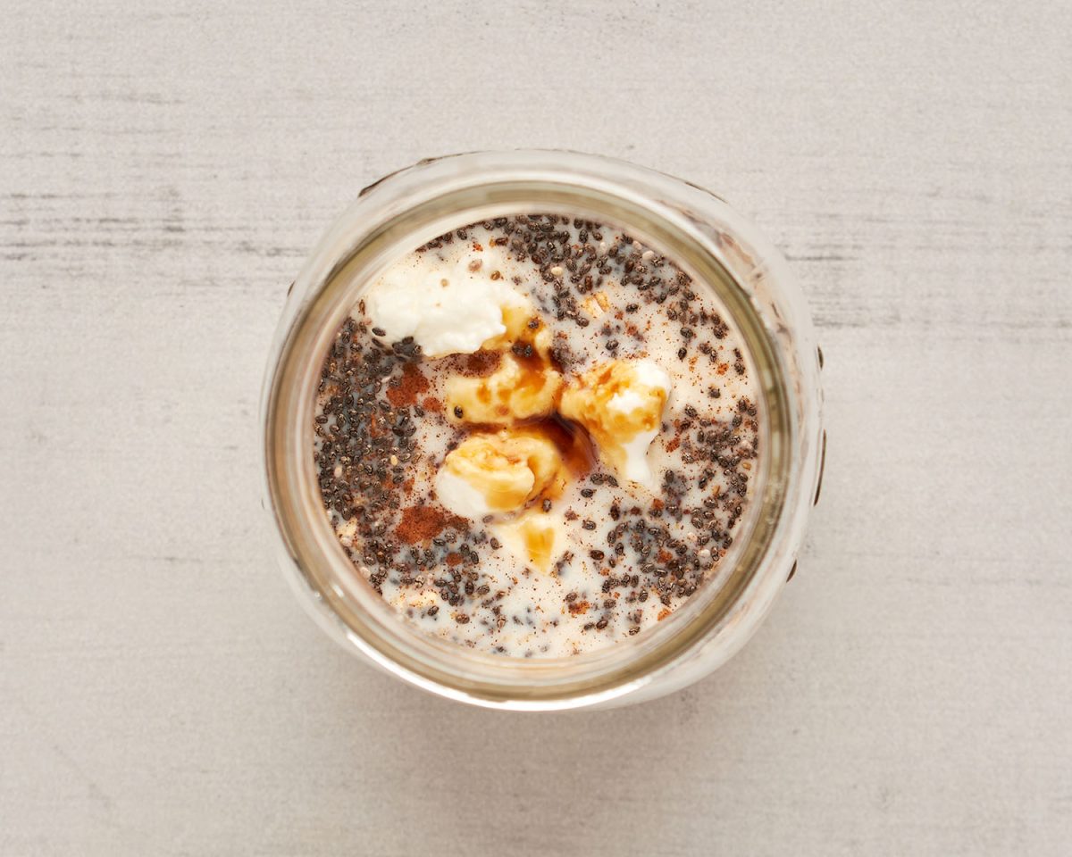 small jar with oats, milk, yogurt, chia seeds, maple syrup, cinnamon, and salt