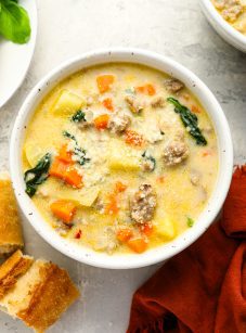 bowl of zuppa toscana with bread