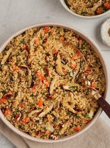 quinoa pilaf with carrots and shiitake mushrooms in bowl