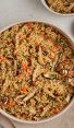 quinoa pilaf with carrots and shiitake mushrooms in bowl