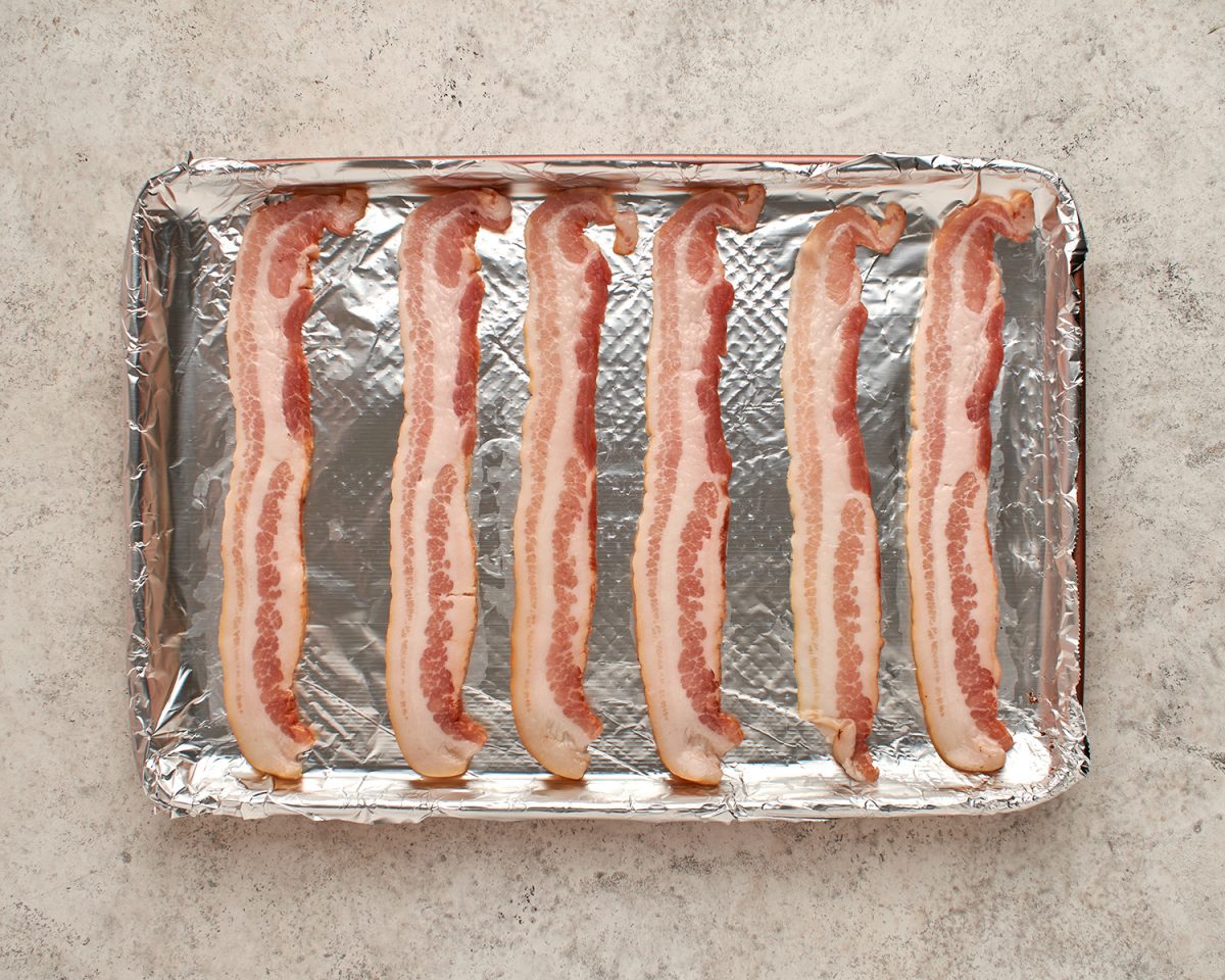 bacon on foil-lined baking sheet